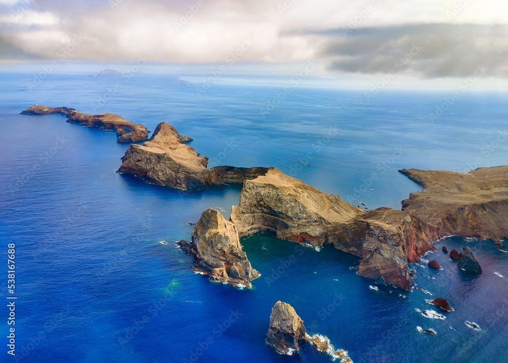 MADEIRA, PORTUGAL Aerial View. Blue sky background with sunny summer clouds