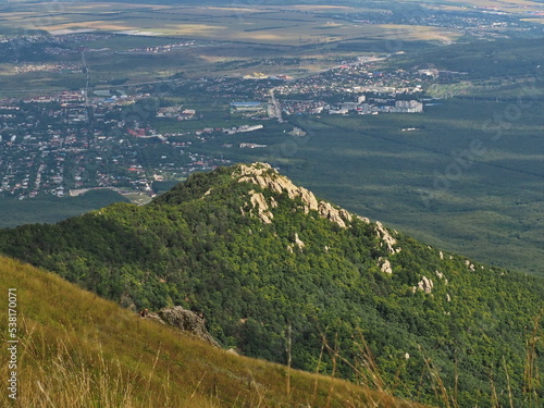 Panoramic view of the mountain slopes and landscape from Mount Beshtau. Pyatigorsk, Russia. photo