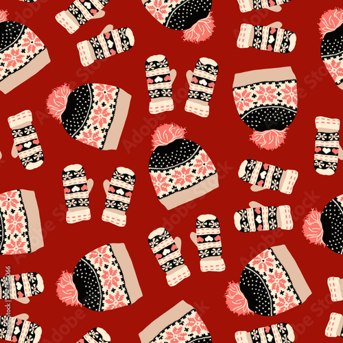 Knitted mittens and hats. Winter time. Seamless pattern. Textile, fabric, print. Red background. Ornaments and hearts. Love day. Cute things. 