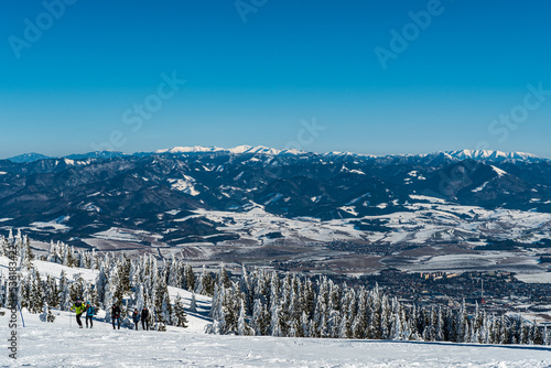 Velka Fatra and Nizke Tatry mountains from Martinske hole in Mala Fatra mountains during beautiful winter day photo