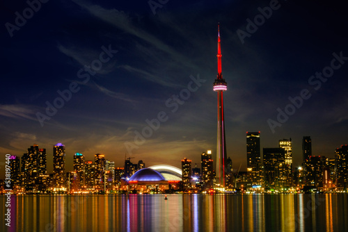 Toronto skyline or cityscape at night. Signs and logos have been removed.