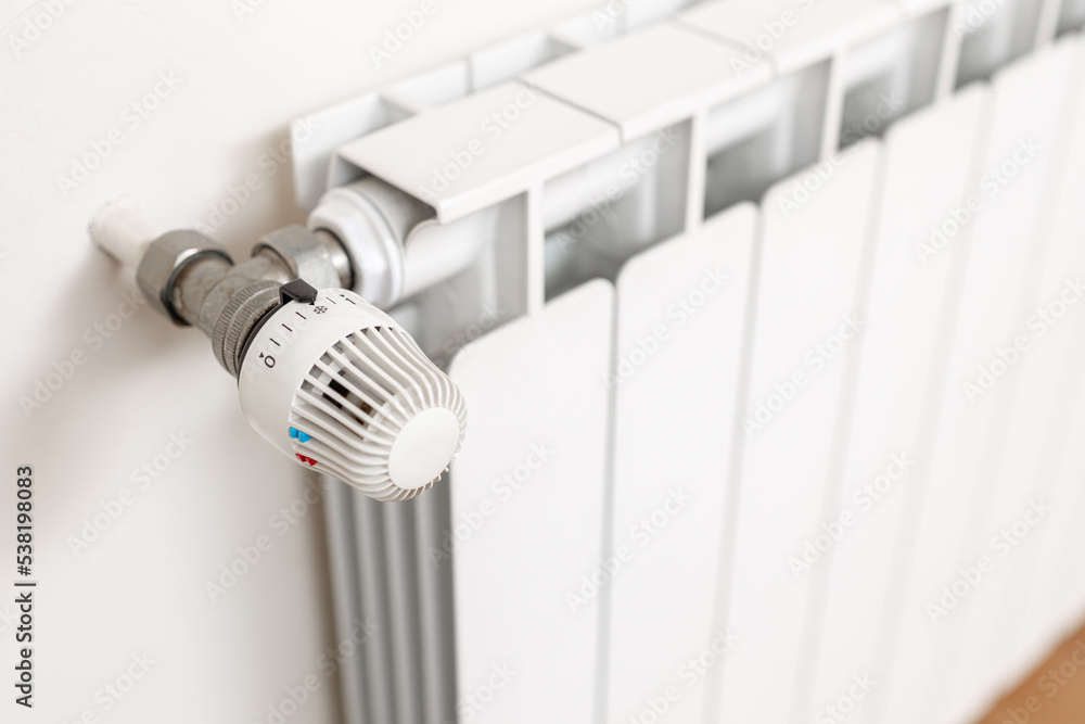Heating radiator thermostat showing cold temperature. Energy crisis concept Heating radiator thermostat showing cold temperature. Energy crisis concept
