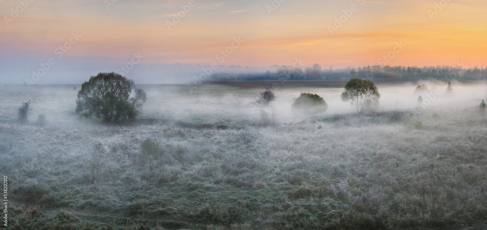 Fog over the river in the early morning on an autumn day. Nature of Ukraine