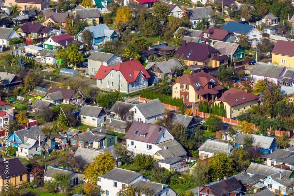 panoramic aerial view of private development with country houses or village