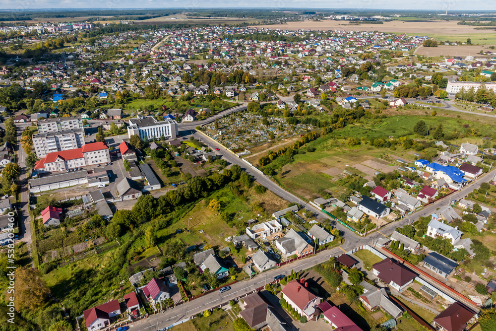 panoramic aerial view of private development with country houses or village