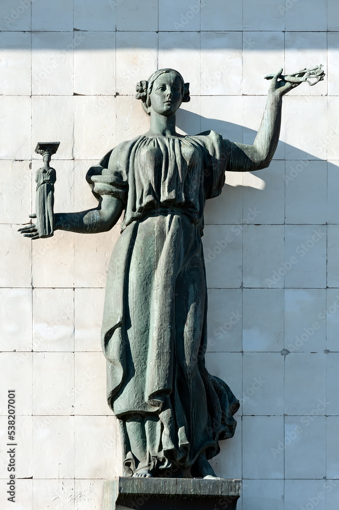 Naklejka premium Allegoric woman sculpture on the old building facade of The Artist’s House in Kyiv, Ukraine