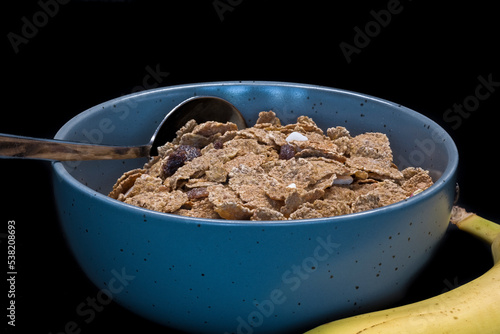 Wallpaper Mural A bowl of bran flakes with dried fruit including banana and raisins Torontodigital.ca