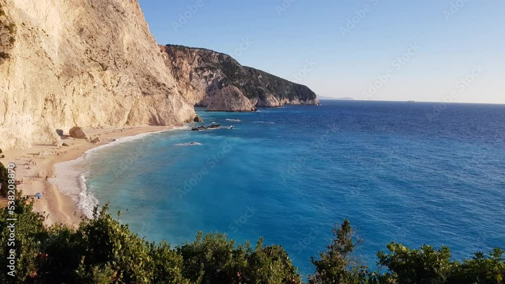 The beautiful turquoise blue color of the Ionian Sea that surrounds the Greek island of Lefkada and Potro Katsiki beach The beautiful turquoise blue color of the Ionian Sea that surrounds the Greek island of Lefkada and Potro Katsiki beach