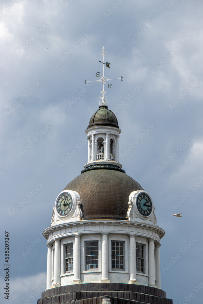 city hall clock tower on a cloudy day