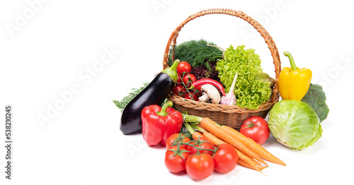 Fototapeta Naklejka Na Ścianę i Meble -  Still-life with fresh vegetables in basket isolated on white, copy space