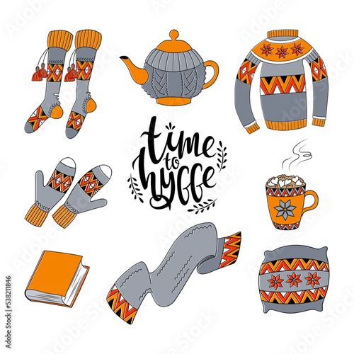 Set of isolated cartoon hygge objects. Autumn and winter. Wool sweater, warm mittens, scarf, socks, tea or coffee cup. Cozy home, leisure, warm clothing. Hand drawn vector elements on white background