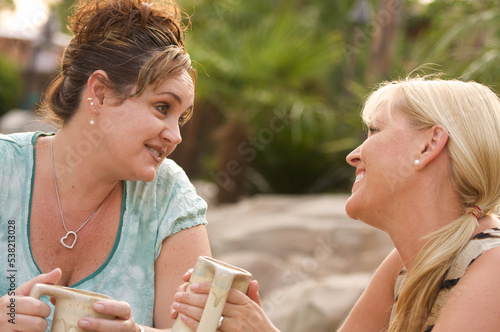 Two Girl Friends Having A C...