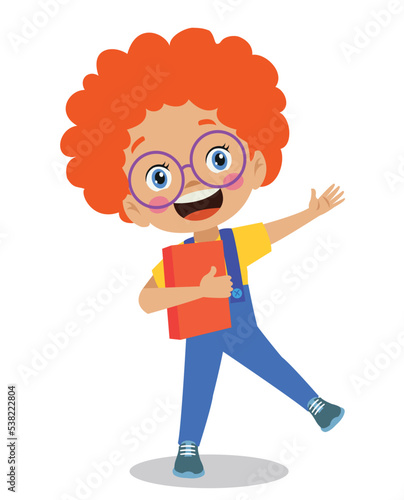 cute happy boy student holding book