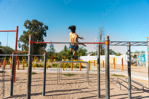 sportsman doing outdoor gymnastics, athlete, calisthenics