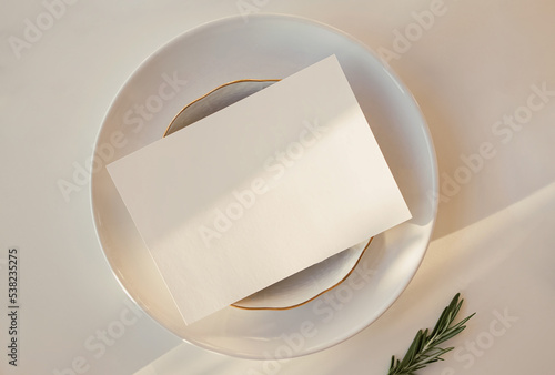 Paper card mock-up in minimalist style, blank paper on the plate