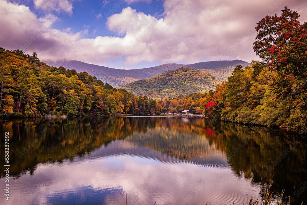 autumn in the mountains with reflections in lake at Vogel state park in Georgia