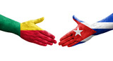 Handshake between Benin and Cuba flags painted on hands, isolated transparent image.