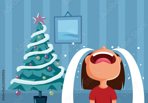 Sad Little Girl Crying on Christmas Day Vector Cartoon. Unhappy child expressing disappointment on holidays gifts after misbehaving
