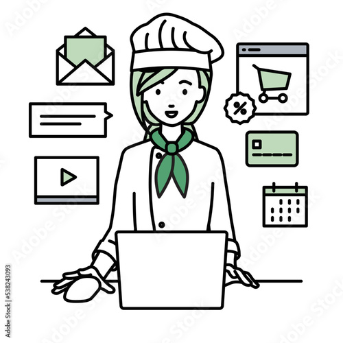 デスクで座ってPCでネットショップやマーケティングの仕事をしている調理師の女性