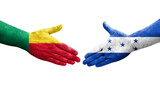 Handshake between Benin and Honduras flags painted on hands, isolated transparent image.
