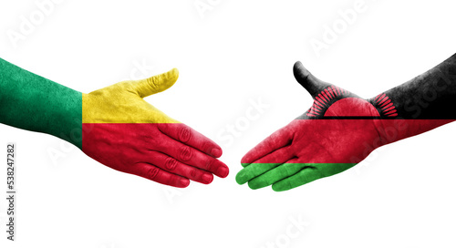 Handshake between Benin and Malawi flags painted on hands, isolated transparent image. photo