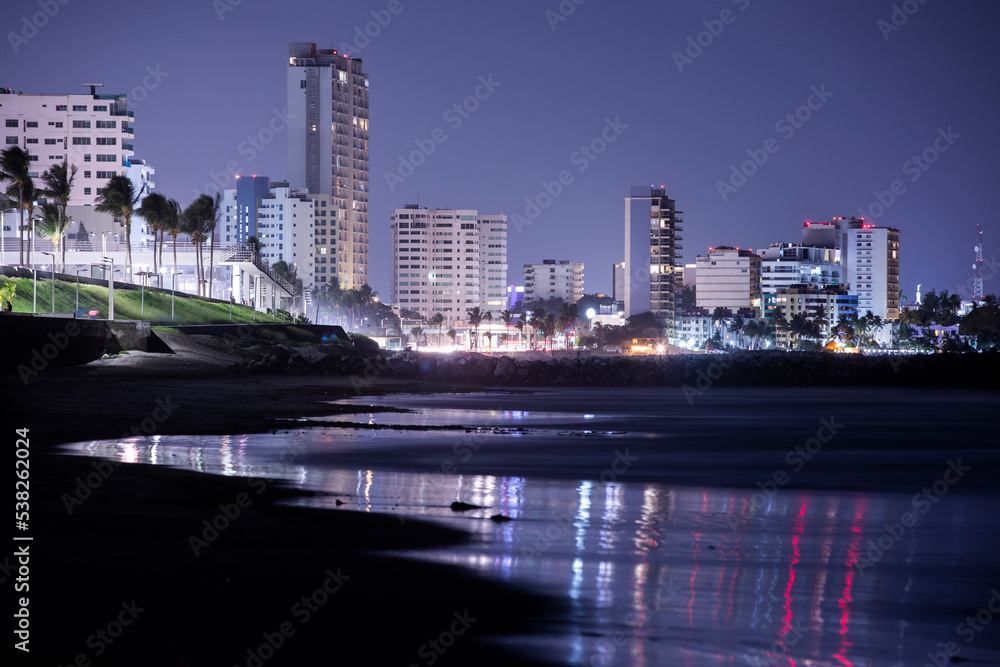 Night time view of the beach front and skyline of Boca Del Rio, Veracruz, Mexico.