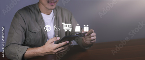 Businessman using smart phone payment with wallet app technology. Businessman paying and shopping with smartphone application. banking,  Digital money transfer and e commerce concept.