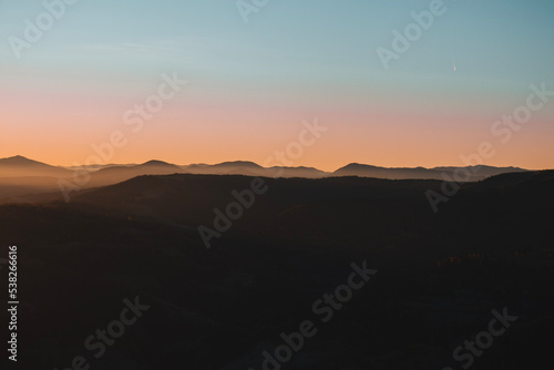 Beautiful mountains view in the morning. Sunrise autumn foggy landscape