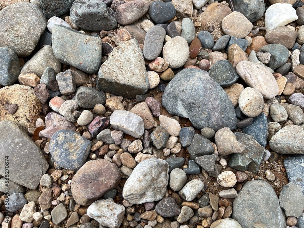 Light brown rock texture. Rough mountain surface. Close-up. Beige stone background with space for design. Web banner. Wide. Panoramic. Sandstone. Solid, rocky, slate. Light brown rock texture. Rough mountain surface. Close-up. Beige stone background with space for design. Web banner. Wide. Panoramic. Sandstone. Solid, rocky, slate.