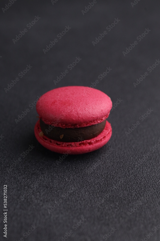 Macaroons in black background Macaroons in black background