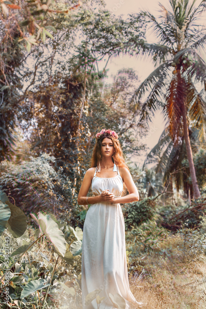beautiful young woman wearing wreath on the field beautiful young woman wearing wreath on the field