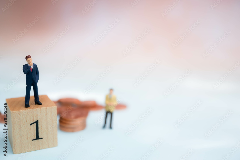 Miniature Business man thinking.Business obstacle,financial,business growth concept.Business man stand on center of maze. Miniature Business man thinking.Business obstacle,financial,business growth concept.Business man stand on center of maze.