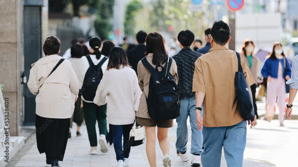 Crowd of younger people walking in Tokyo, Japan Crowd of younger people walking in Tokyo, Japan