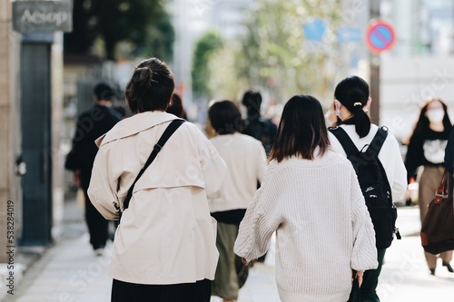 Crowd of younger people walking in Tokyo, Japan 