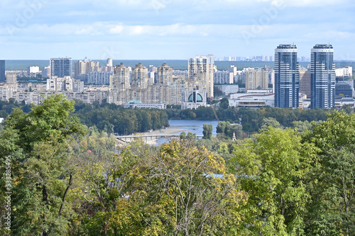 Top view of residential buildings and the Dnieper river in the city of Kyiv 