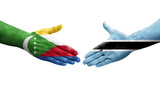 Handshake between Botswana and Comoros flags painted on hands, isolated transparent image.