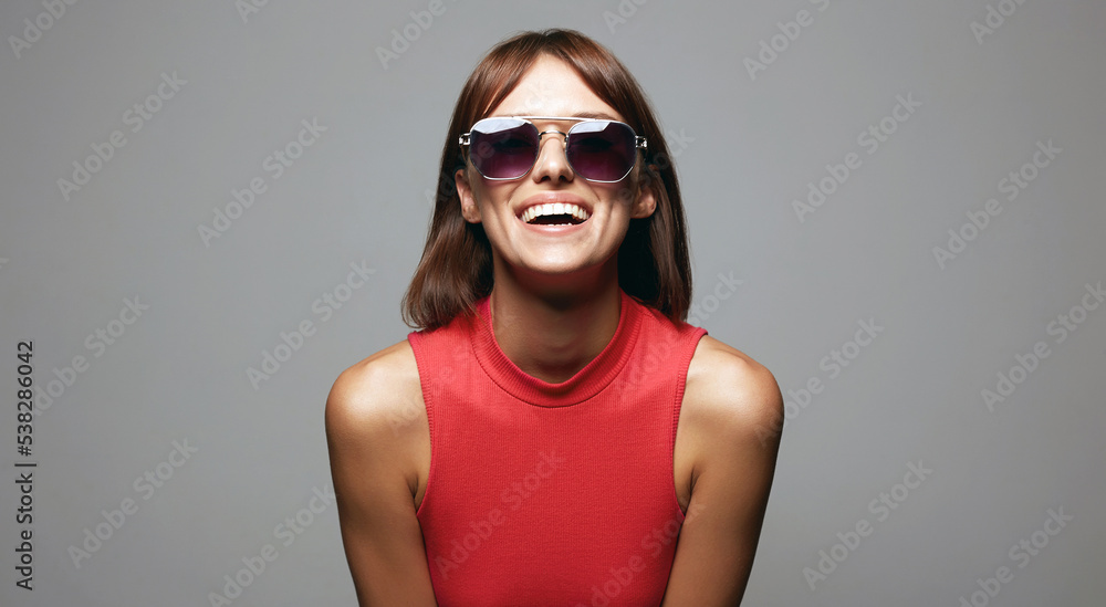 Happy beautiful Girl in Sunglasses. Smiling young woman Happy beautiful Girl in Sunglasses. Smiling young woman