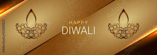 beautiful happy diwali greeting with burning diya for festival of lights