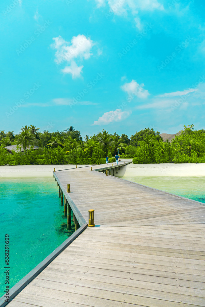 Exotic wooden villa on the water at Club Med Finolhu, a resort located on a very quiet and comfortable small island in the Maldives with stunning sea views	