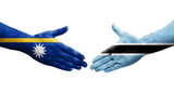 Handshake between Botswana and Nauru flags painted on hands, isolated transparent image.