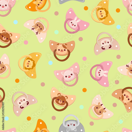 Seamless children s pattern on a green background. A dummy with animals. Pacifier for children
