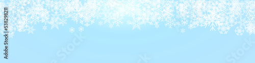 Vector Winter Background. A cold Christmas with snowfall and ice crystals banner