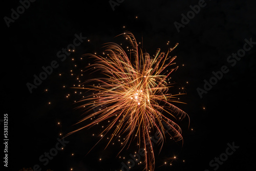 Colorful firework in celebration night with night sky background.