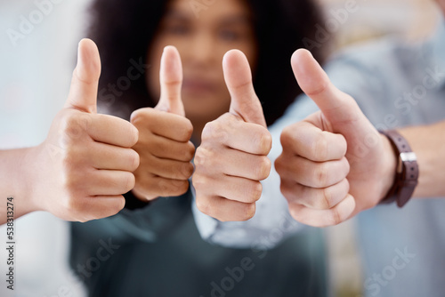 Thumbs up, support and business people in collaboration for a thank you, agreement or success together at work. Hand sign of corporate workers working with motivation, community and happy with team