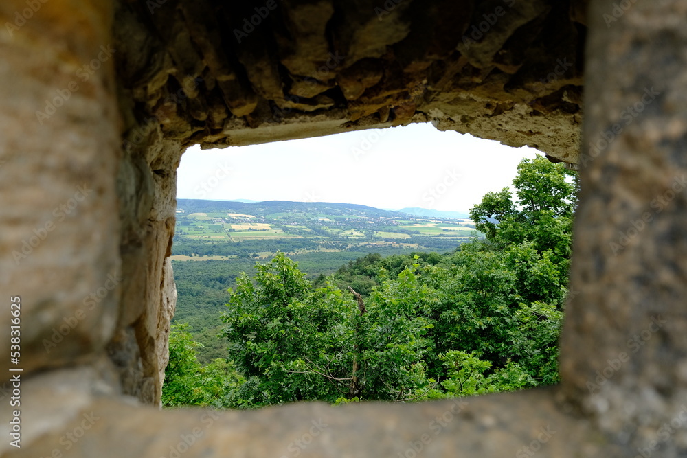 view from castle ruin with hills and fields