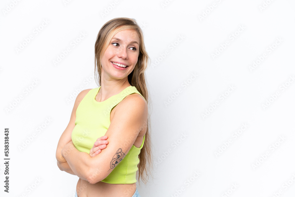Young caucasian woman isolated on white background with arms crossed and happy Young caucasian woman isolated on white background with arms crossed and happy