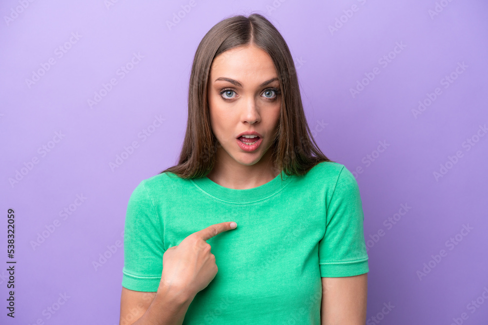 Young caucasian woman isolated on purple background pointing to oneself Young caucasian woman isolated on purple background pointing to oneself