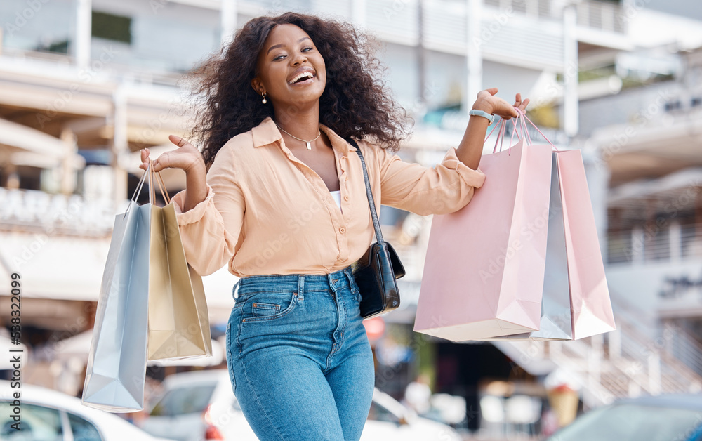 Black woman, retail shopping bag and outdoor excited tourism, travel or  buying, sales and market retail fashion store promotions in San Francisco.  Happy portrait of wealthy city girl shopper purchase Photos