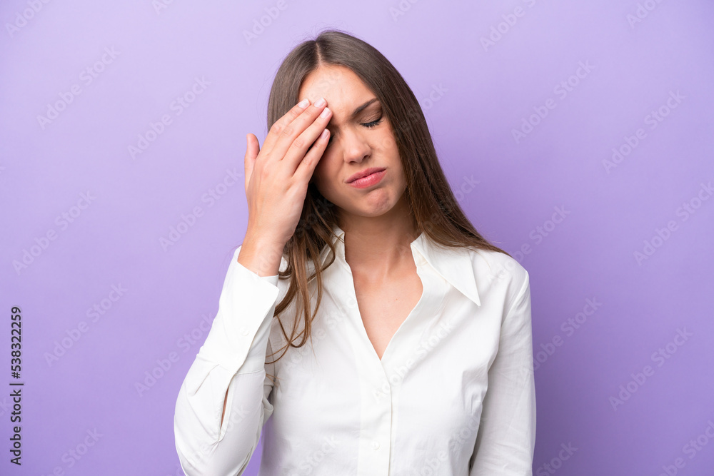 Young caucasian woman isolated on purple background with headache Young caucasian woman isolated on purple background with headache