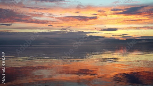 Sunrise over lake and beautiful morning landscape. © filin174